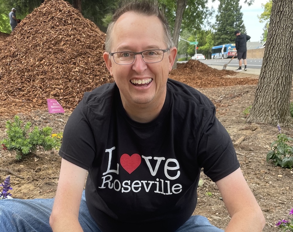 Picture of Ryan volunteer gardening